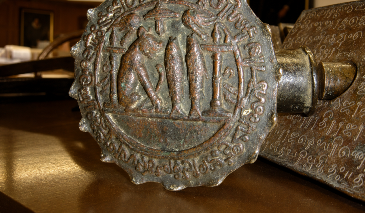 Close-up of the Anaimangalam Copper Plates with royal seal