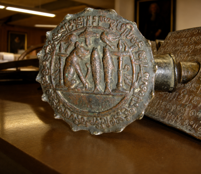 Close-up of the Anaimangalam Copper Plates with royal seal